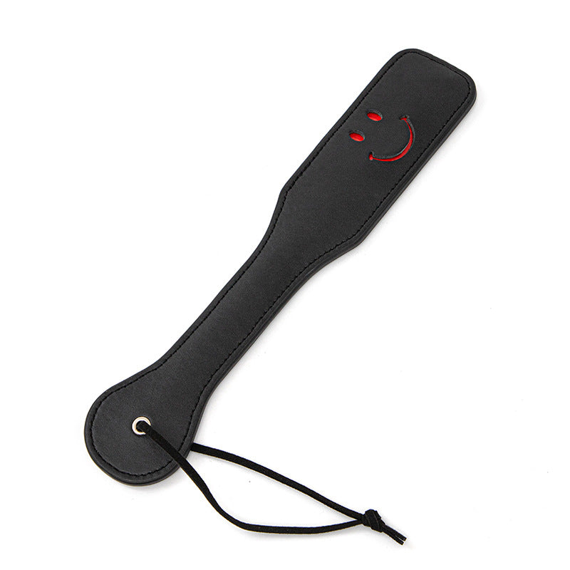Paddle, whip for bdsm in leather