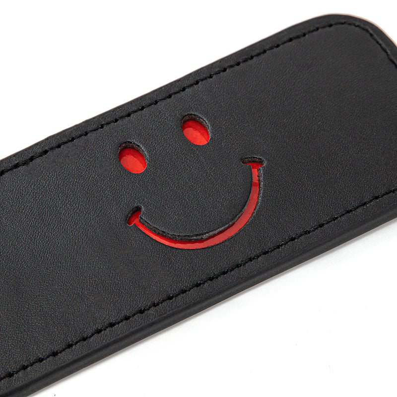 Paddle, whip for bdsm in leather