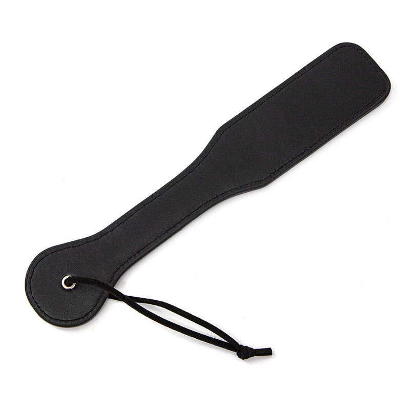 Paddle, whip for bdsm in leather