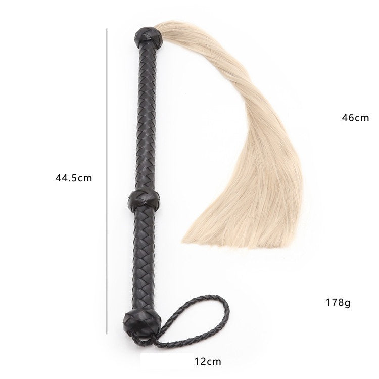 Flogger, whip in black leather with hair
