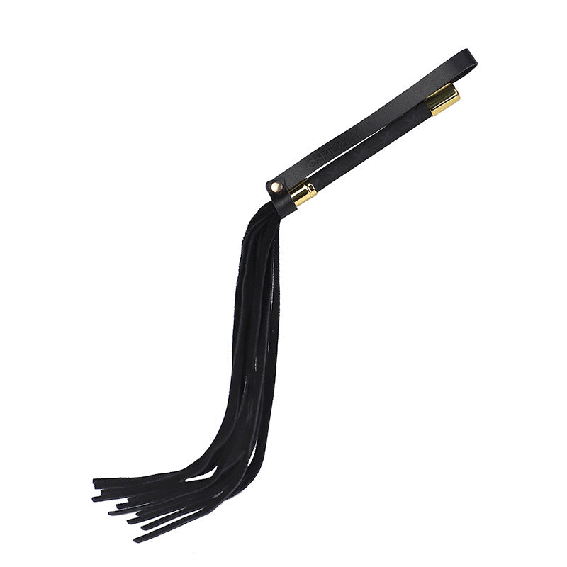 Luxurious flogger, whip in black genuine leather with brass details