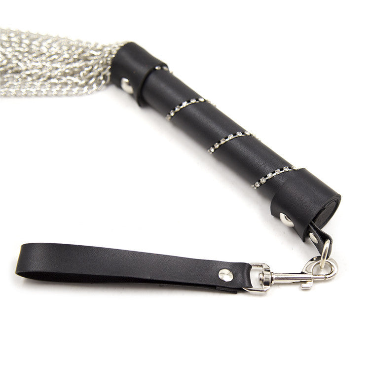 Flogger, whip in rhinestones and metal