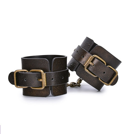 Handcuffs, wrist cuffs or ankle cuffs in genuine leather or skin