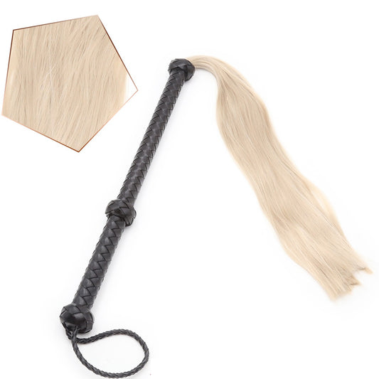 Flogger, whip in black leather with hair