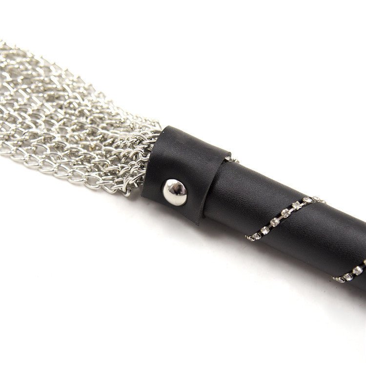 Flogger, whip in rhinestones and metal