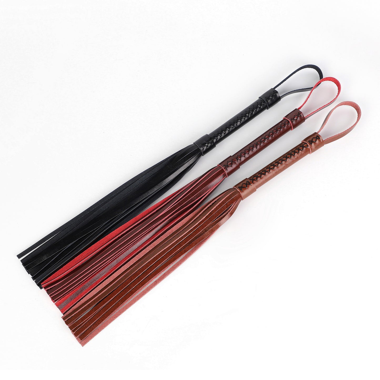 Flogger, whip in genuine leather. Available in several colors