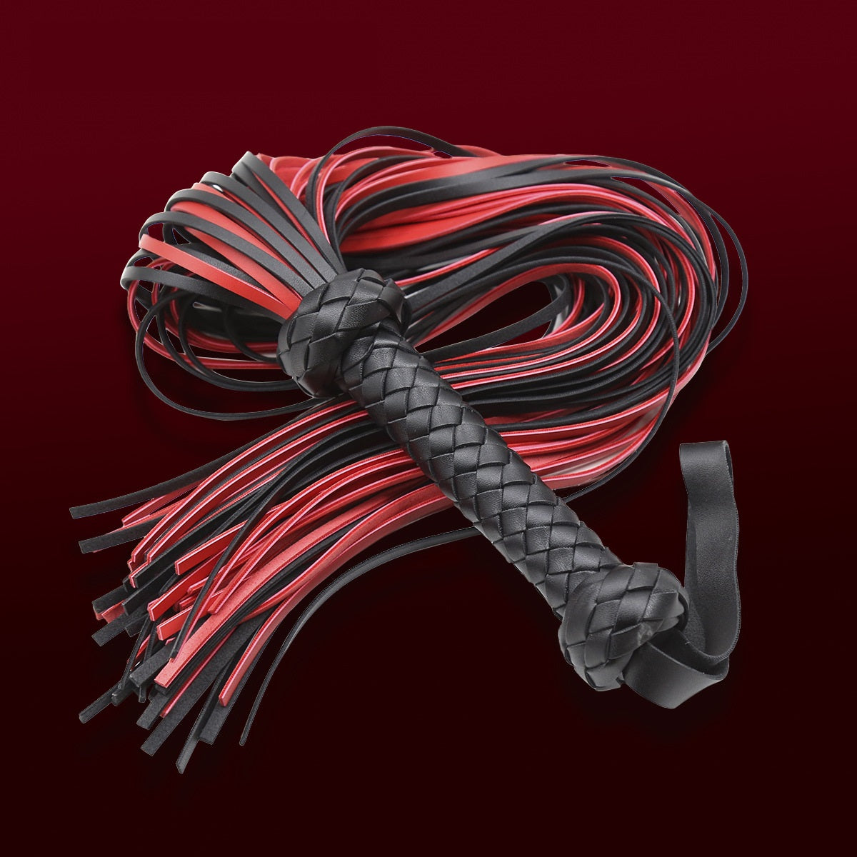 Flogger, whip, black and red