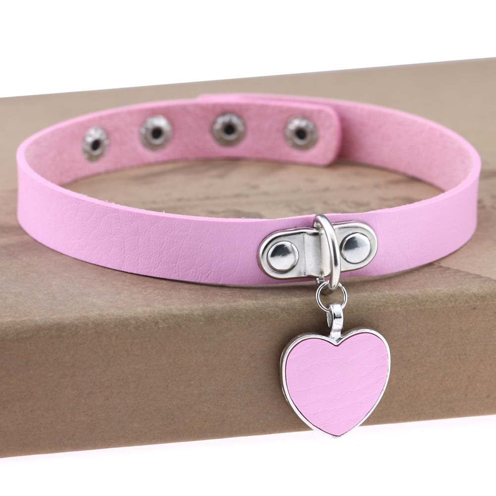 Rosa halsband eller choker med rosa hjärta