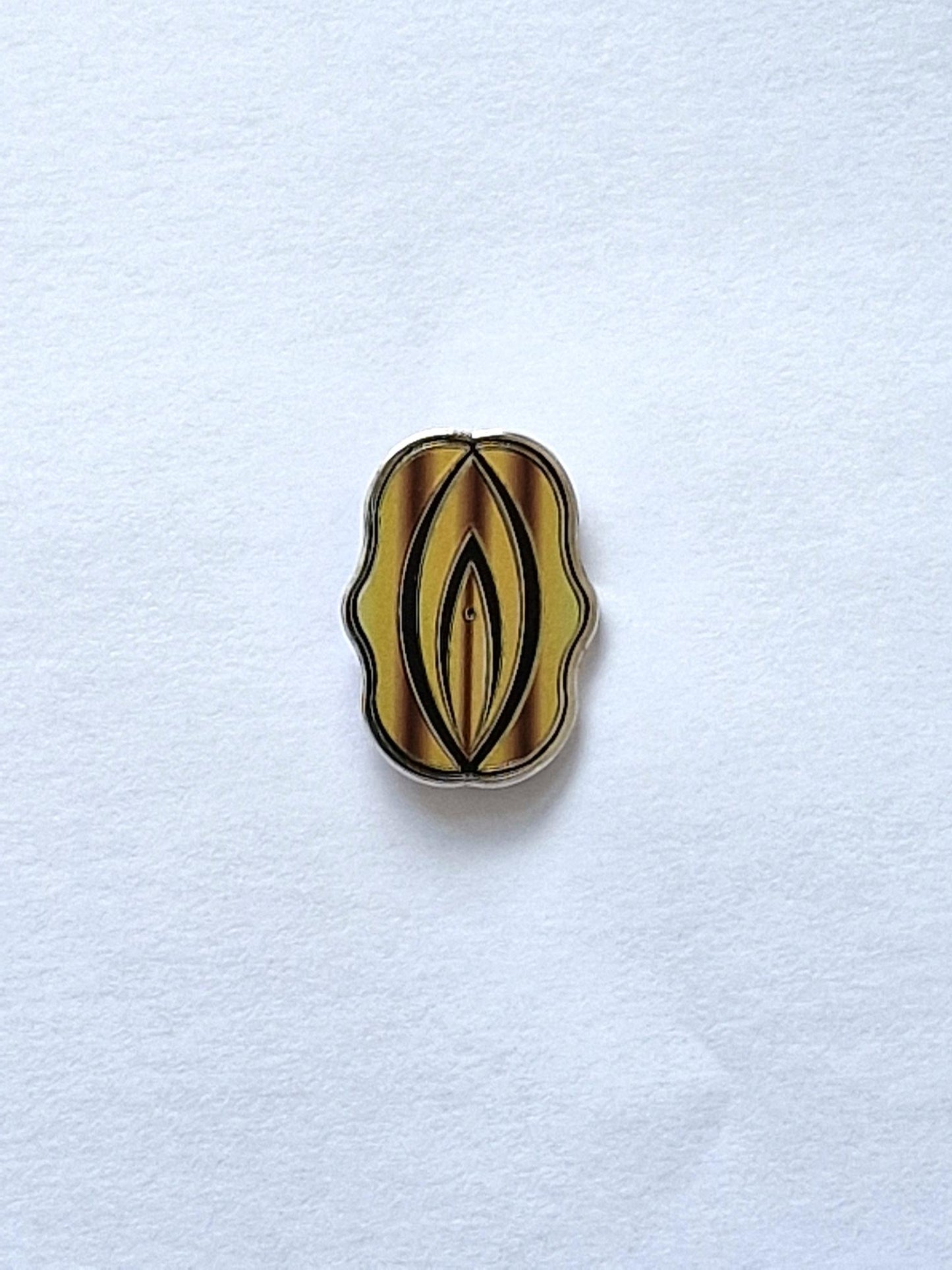 Different and fun pin, gold and black fifi.
