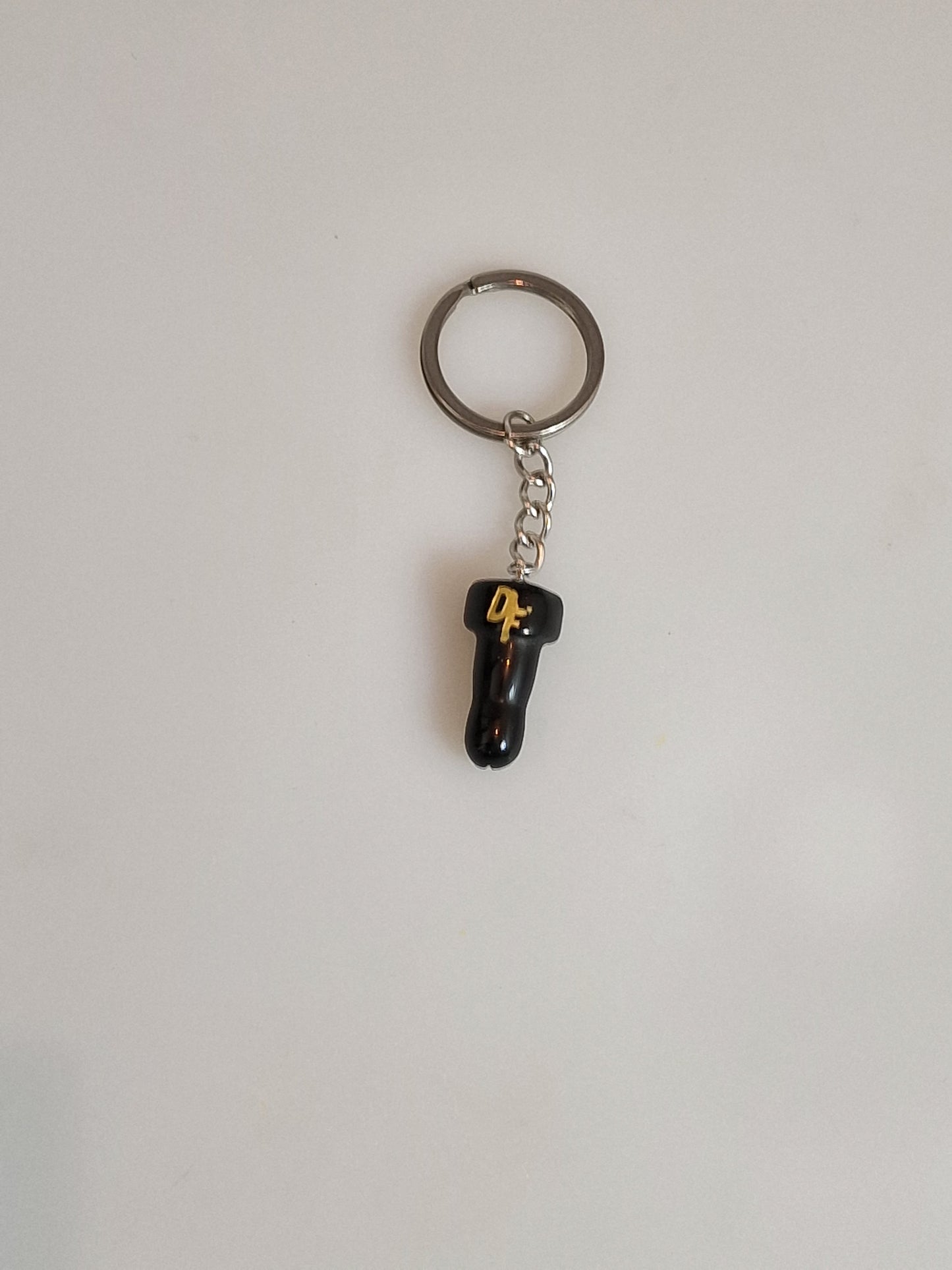 Upptäck Nyckelringen som Förenar Stil med Personlighet – Dickfashions Penisformade Kristall i Svart Onyx