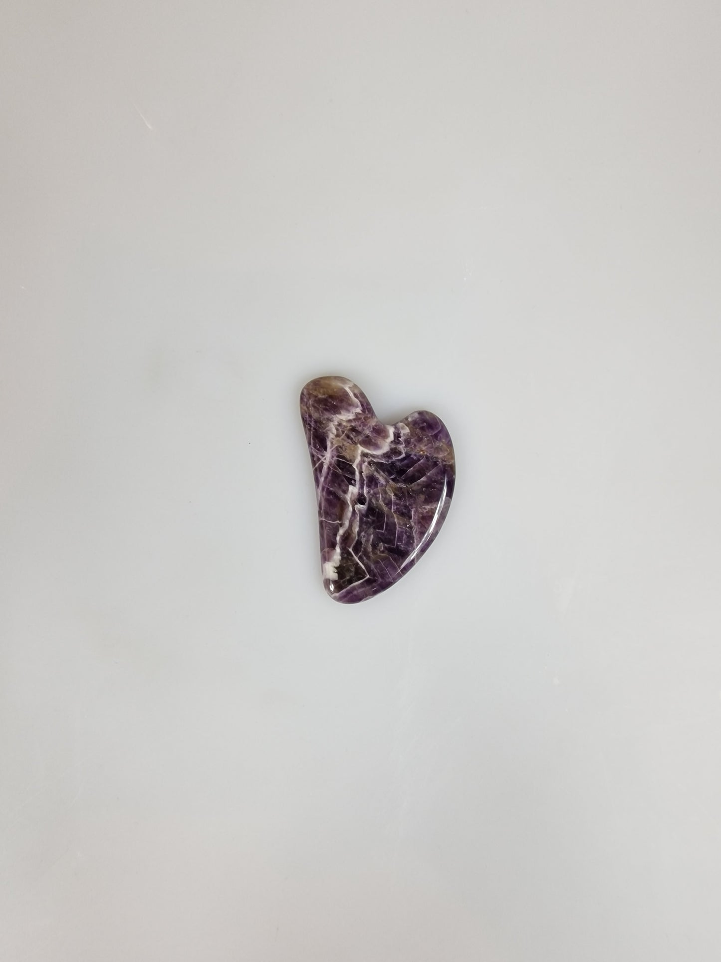 Ansiktsskrapa. Face scrapers. Ametist, amethyst.