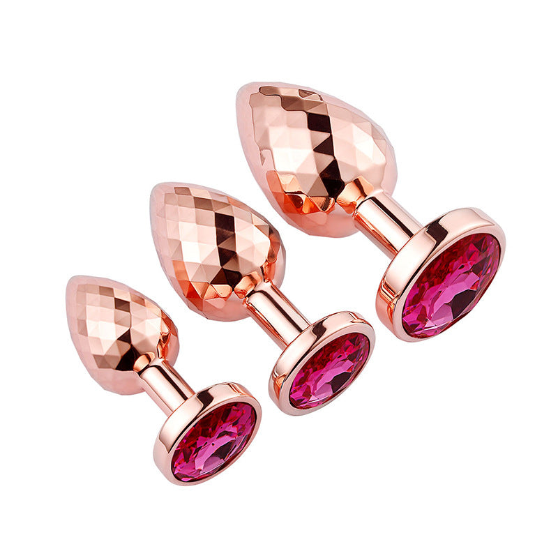 Buttplug aus nickelfreiem roséfarbenem Stahl mit Muster