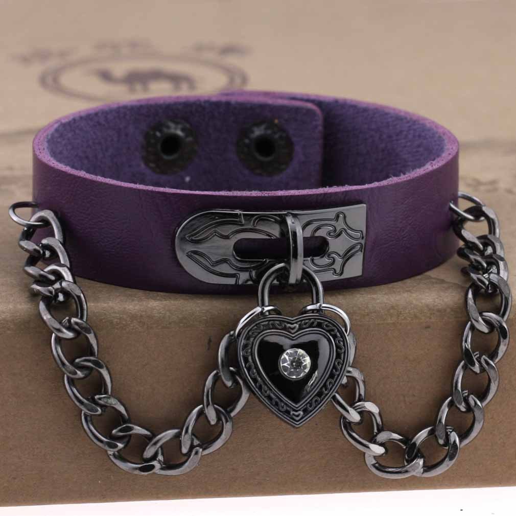 Leather armband with black chains and heart with crystal