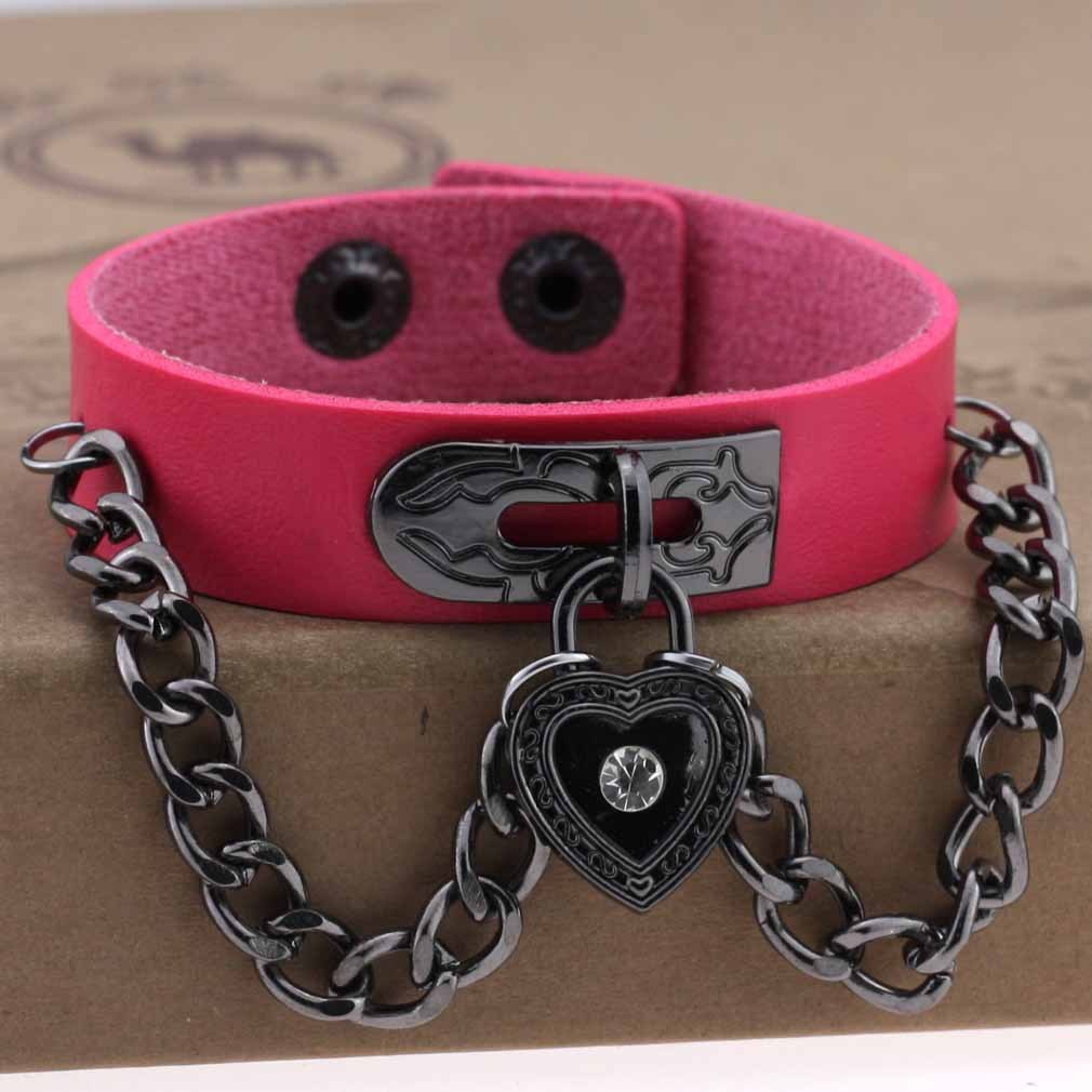 Leather armband with black chains and heart with crystal