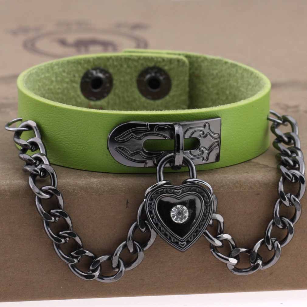 Leather armband with black chains and heart with crystal