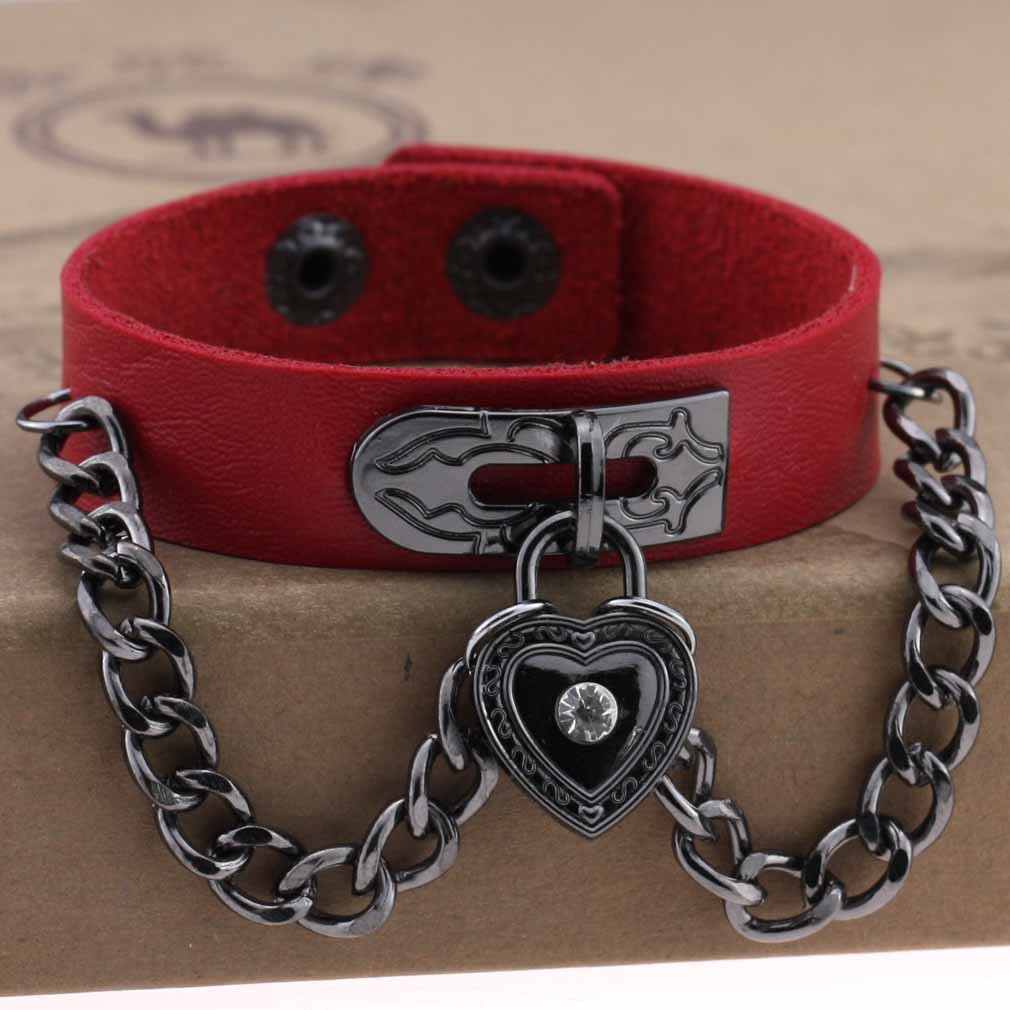 Leather armband with black chains and heart with crystal