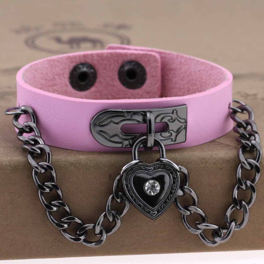 Leather armband with black chains and heart with crystal