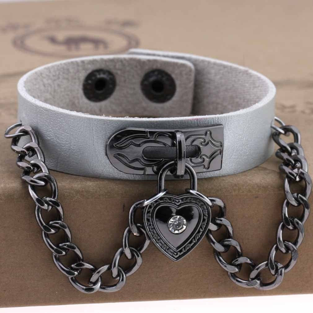 Leather armband with black chains and heart with crystal