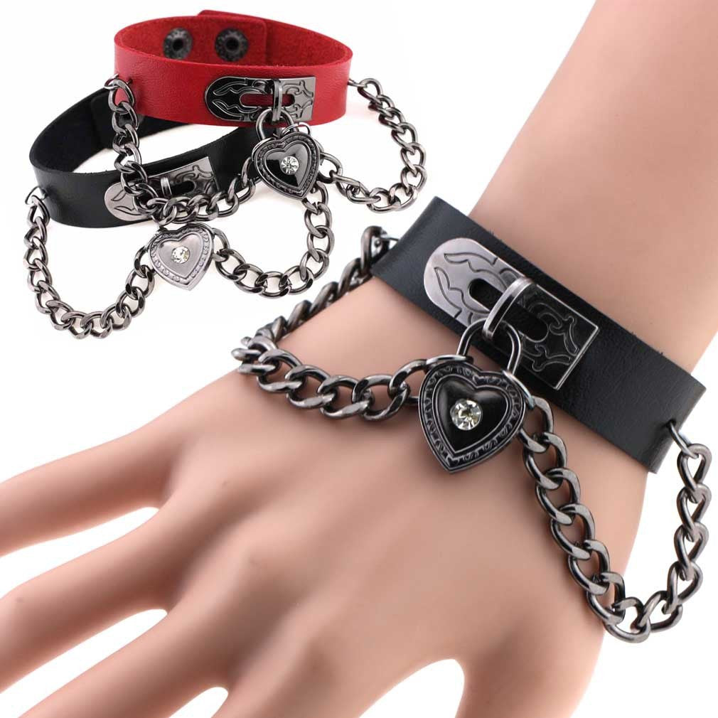 Leather armband with black chains and heart with crystal