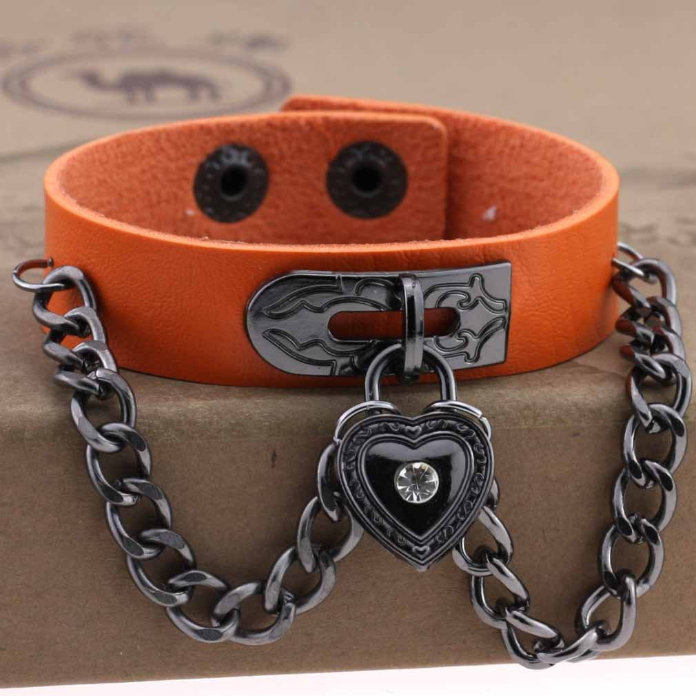 Leather armband with black chains and heart with crystal