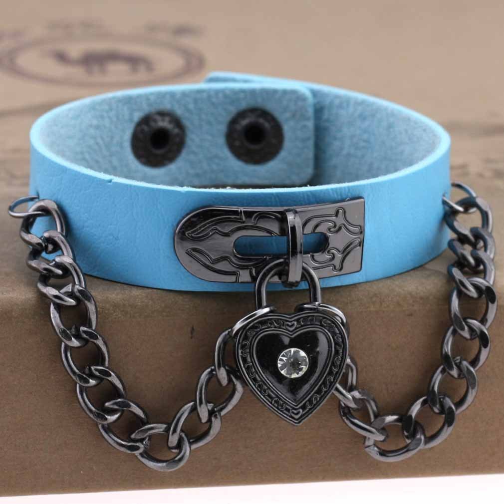 Leather armband with black chains and heart with crystal