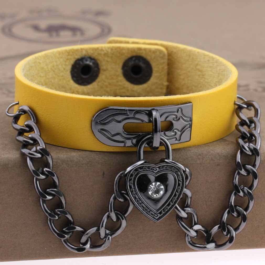 Leather armband with black chains and heart with crystal