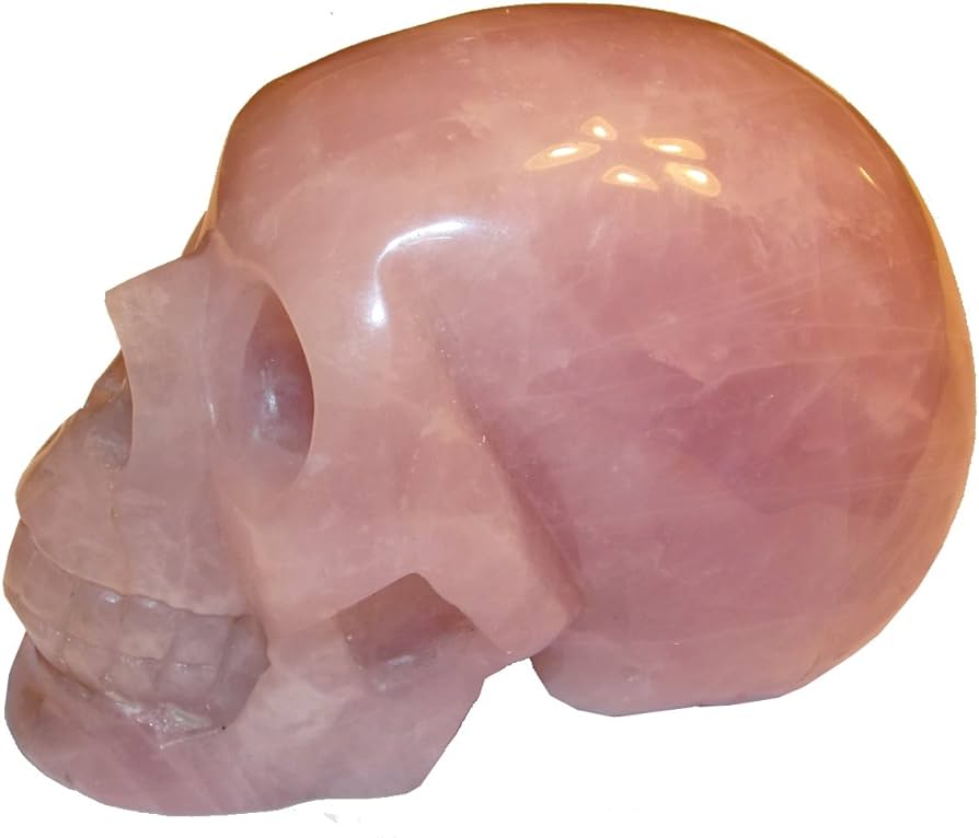 Calavera de cristal grande en cuarzo rosa, calavera de cristal en cuartos de rosa