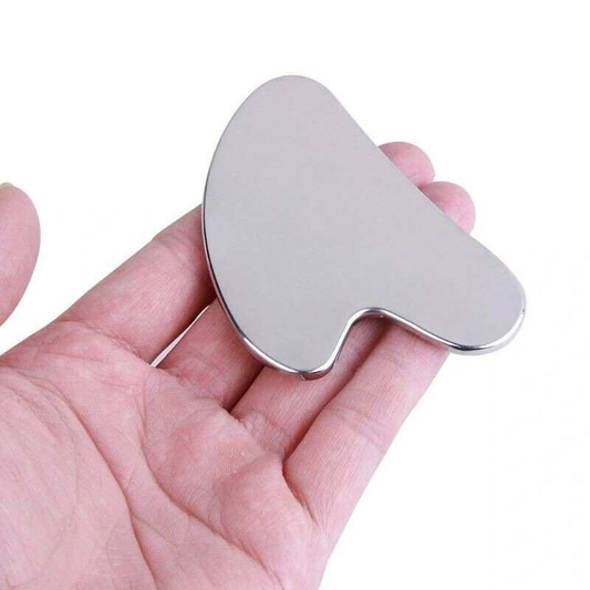 Face scraper or face scraper in a beautiful box. The scraper is made of a fantastic stainless metal and is nickel free.