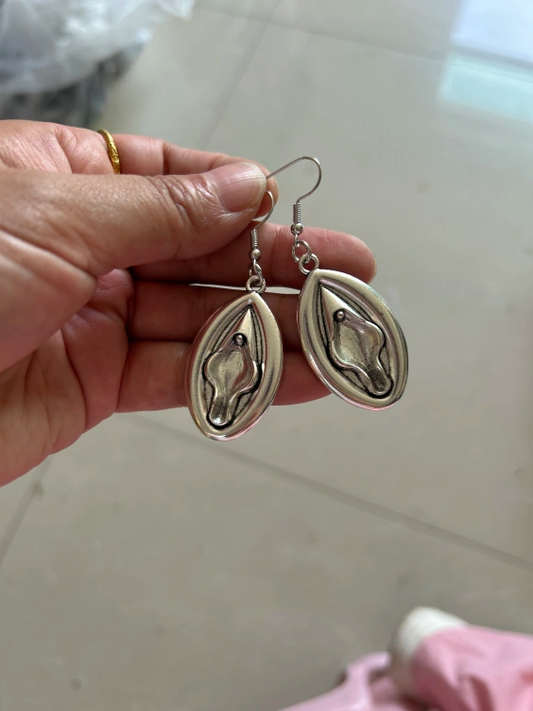 Metal earrings with fifi, snippa or vagina