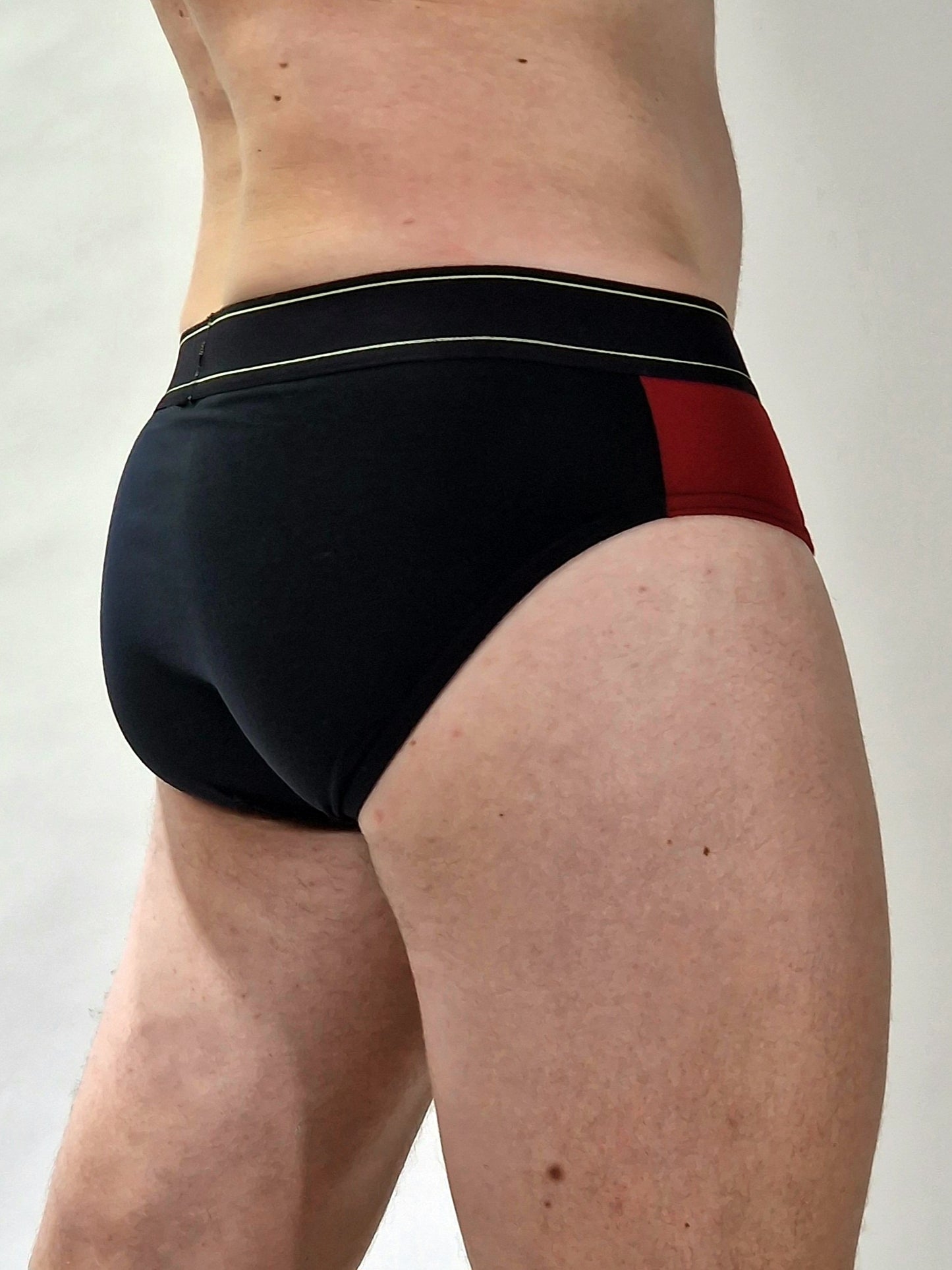 Männerunterwäsche. Schwarze rote Slips, Unterhosen