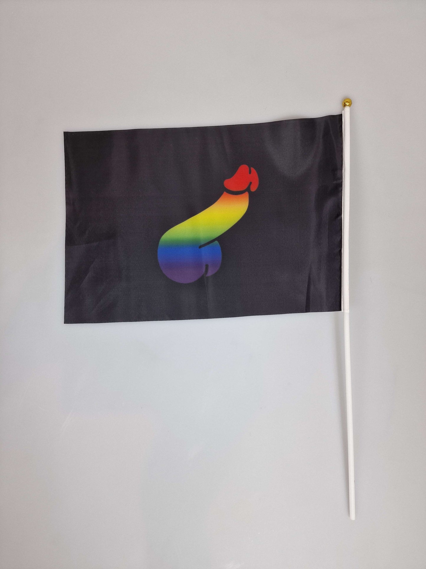 Flaggor på pinne, handflagga eller handflaggor för Pride och andra parader