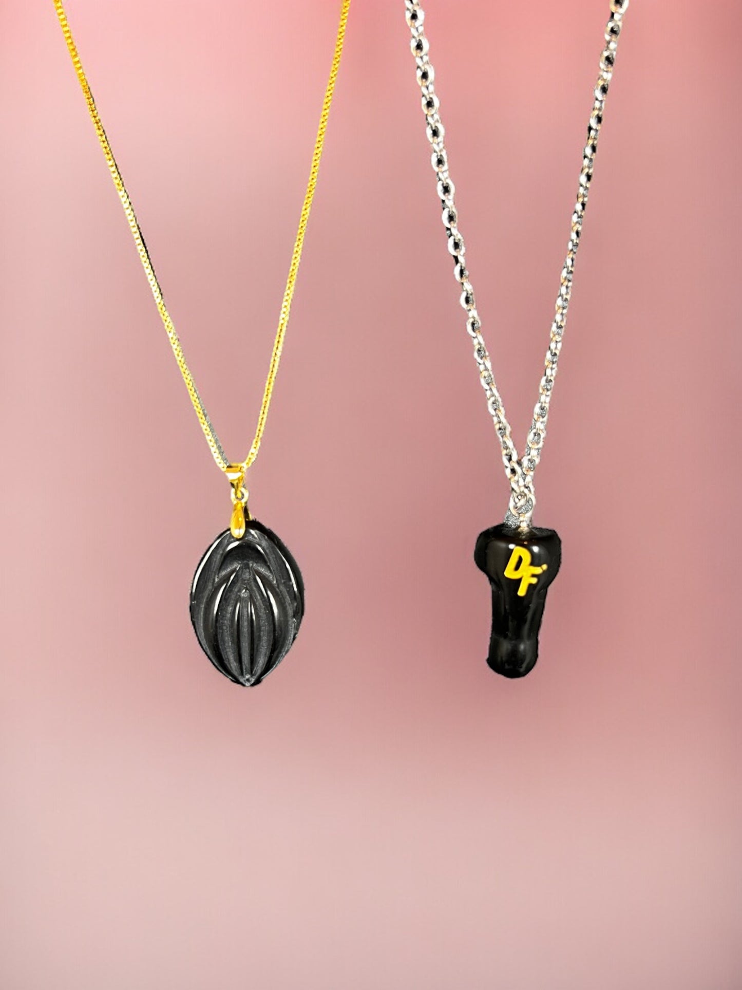 2 different necklaces with crystals, a crystal dick and a crystal fifi. A combination offer.