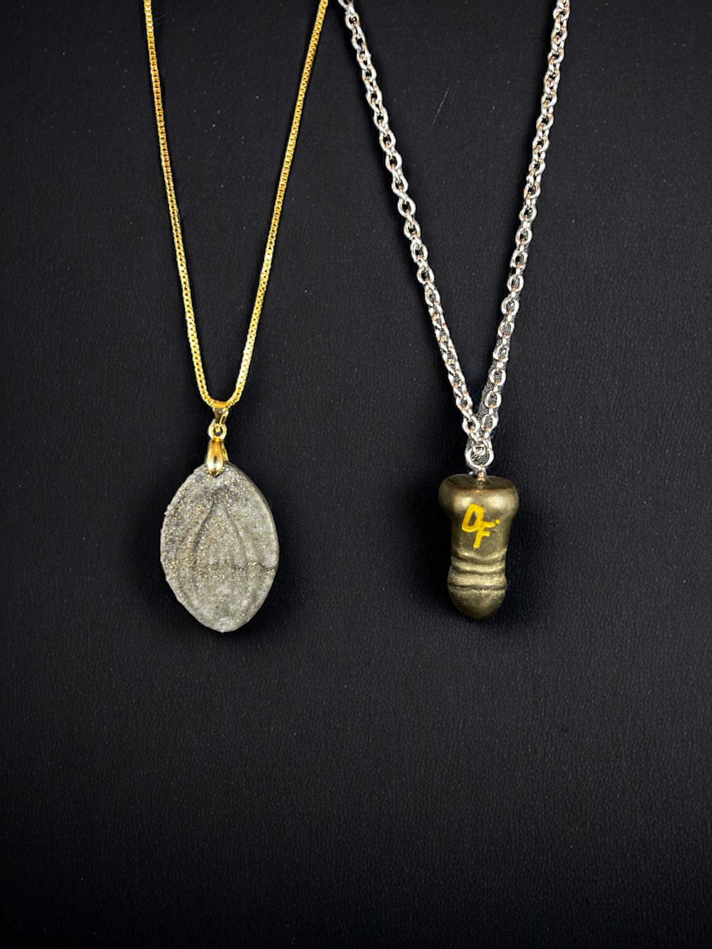 2 different necklaces with crystals, a crystal dick and a crystal fifi. A combination offer.
