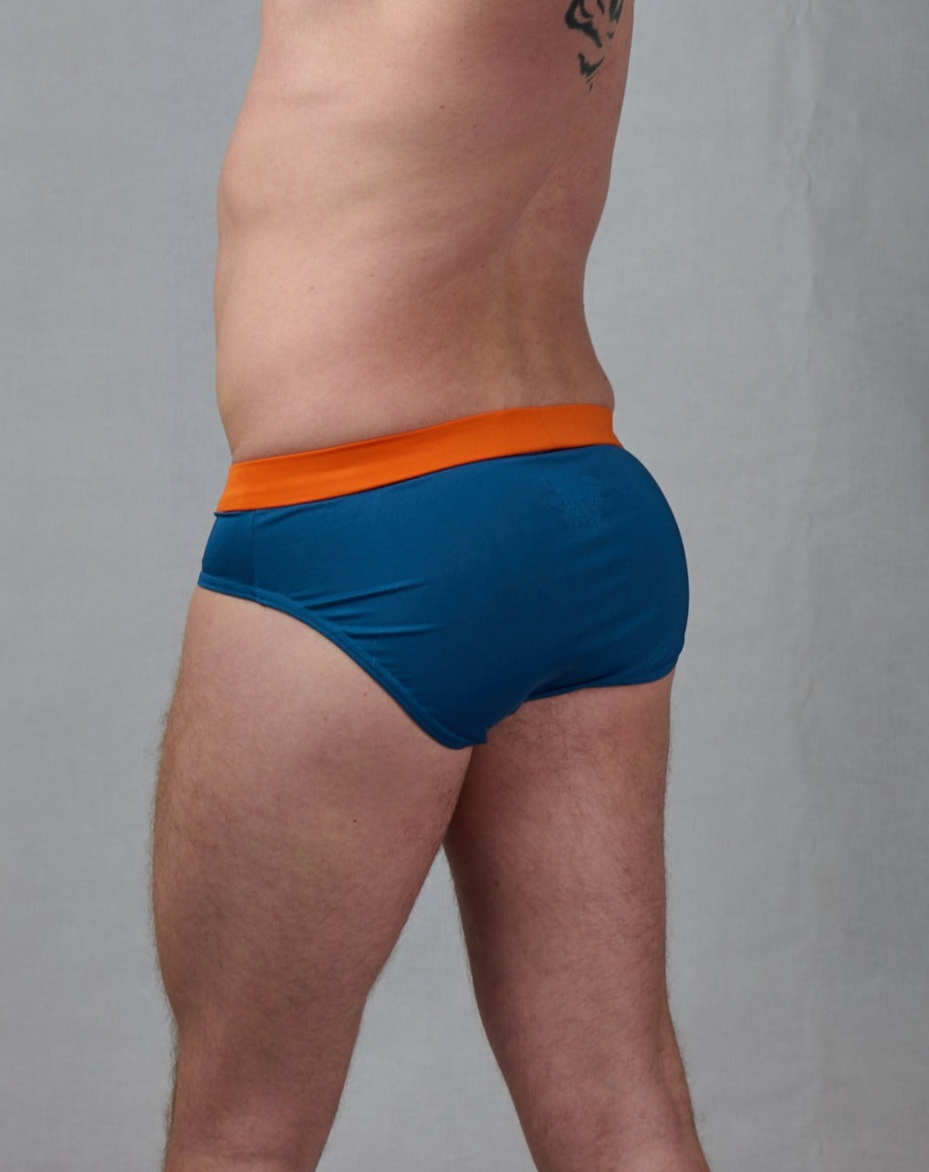Badbyxor, swim speedos med orange linning och blå byxa, med push up