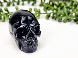 Calavera de cristal grande en ónix negro