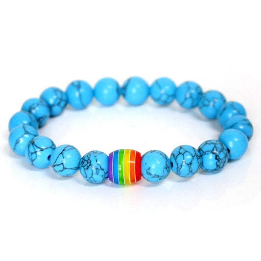 Armband in turquoise crystals and pride bead