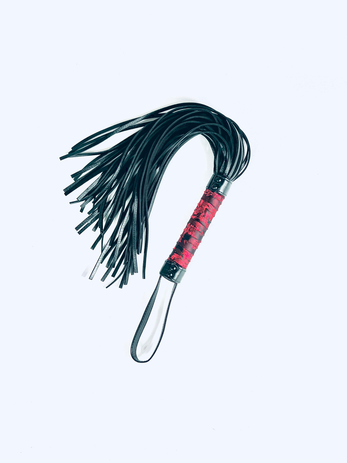 Flogger, piska i läder