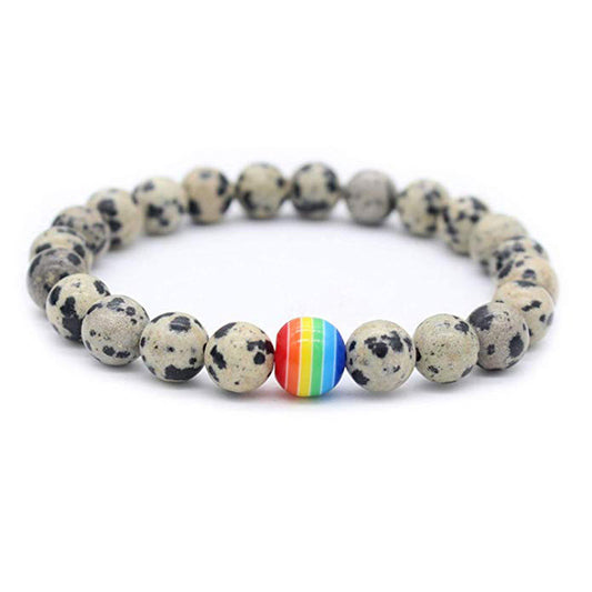 Bracelet with dalmatian jasper crystals and pride bead
