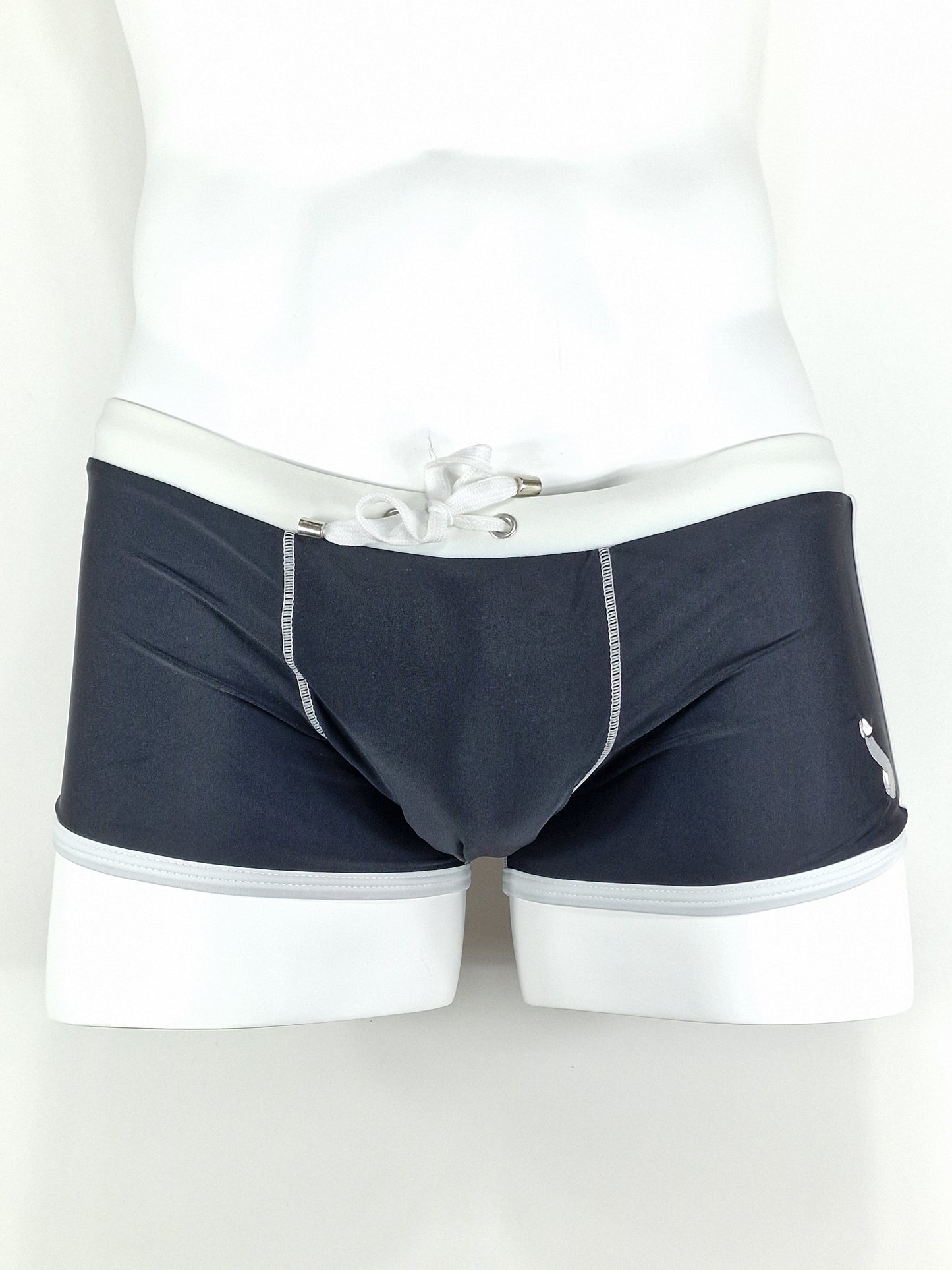 Swimming trunks or stylish trunks with a white border