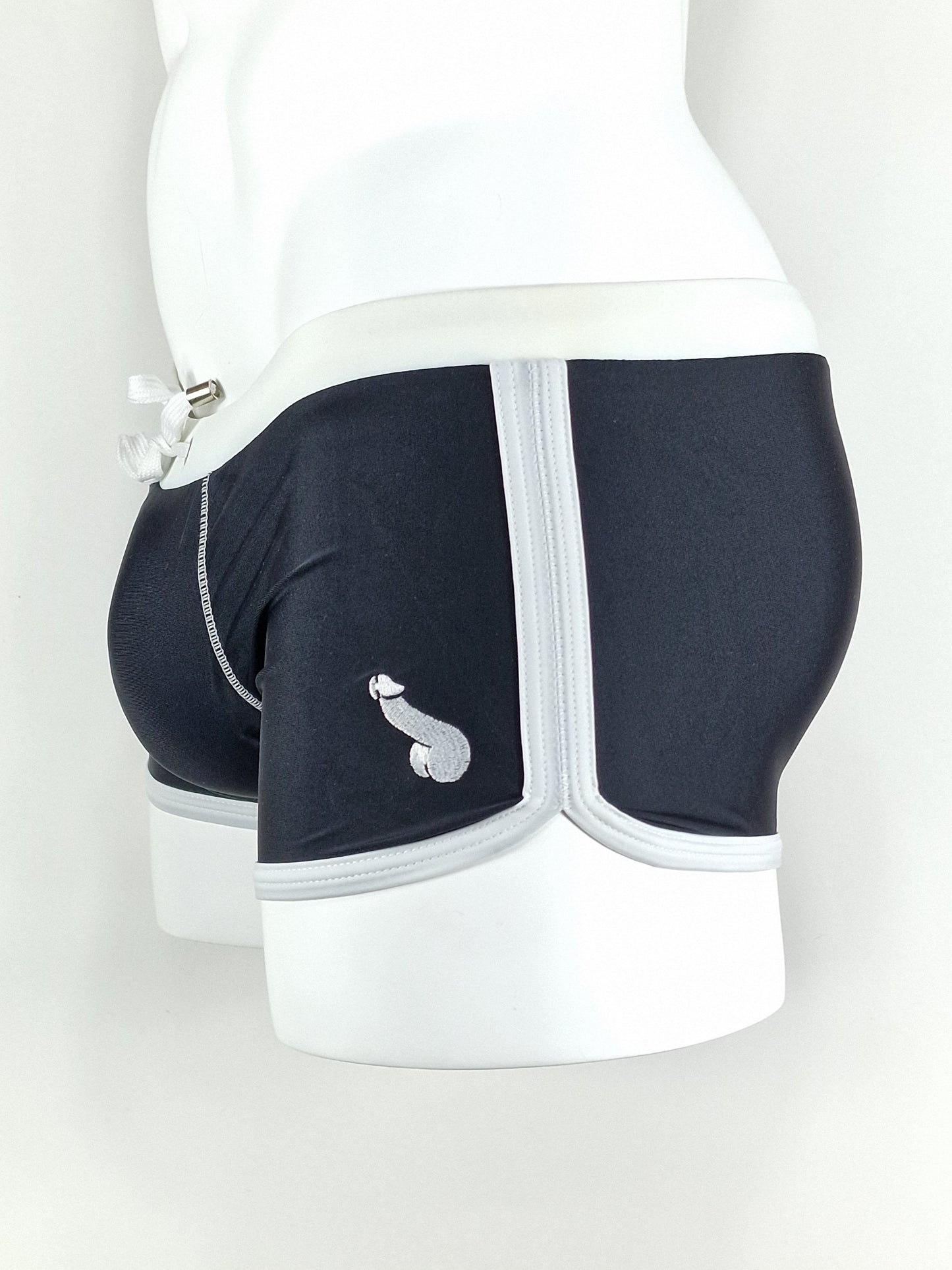 Swimming trunks or stylish trunks with a white border