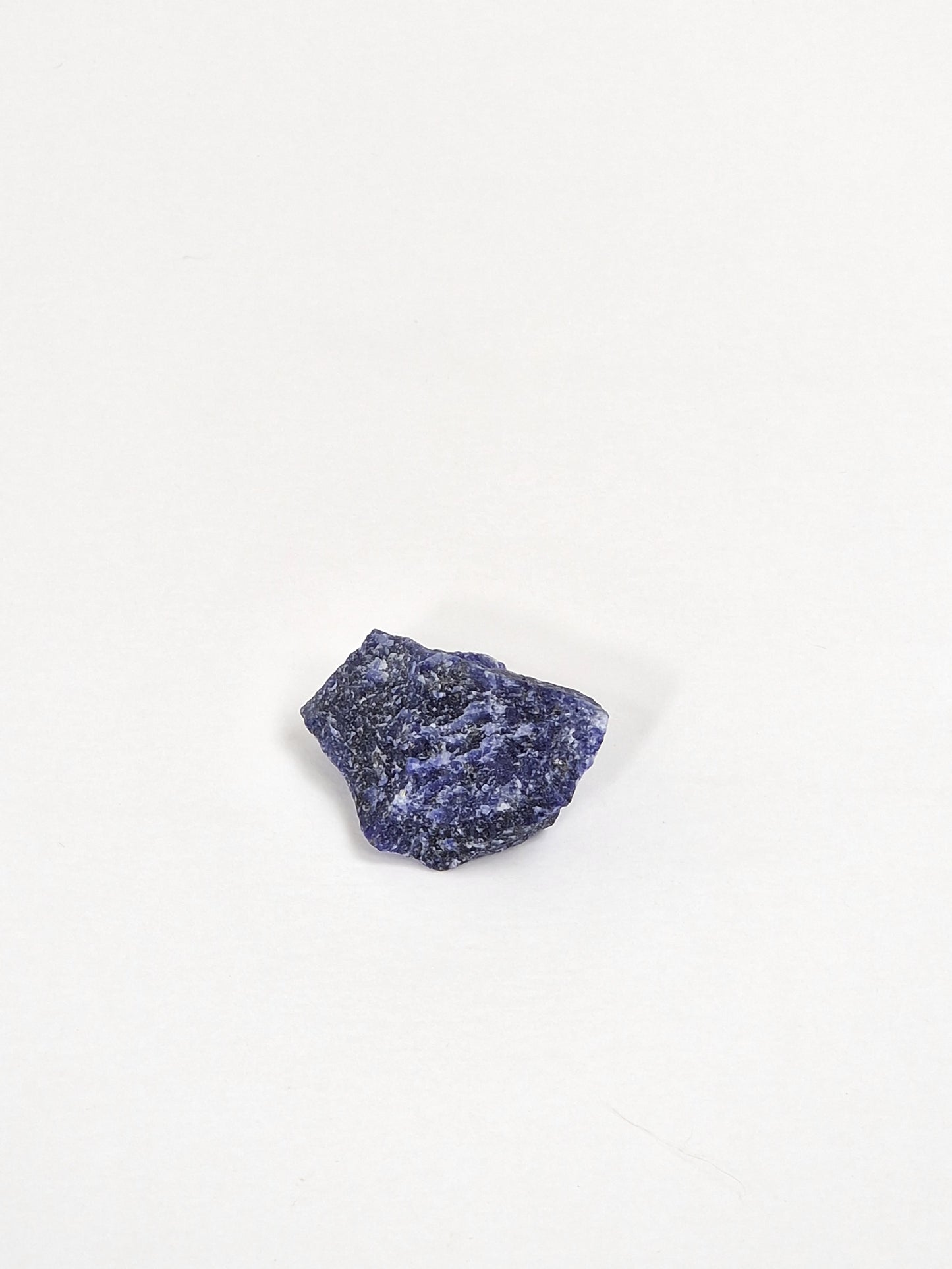 Sodalite, sodalite crystal with white sage smudge stick and Palo Santo, sacred wood