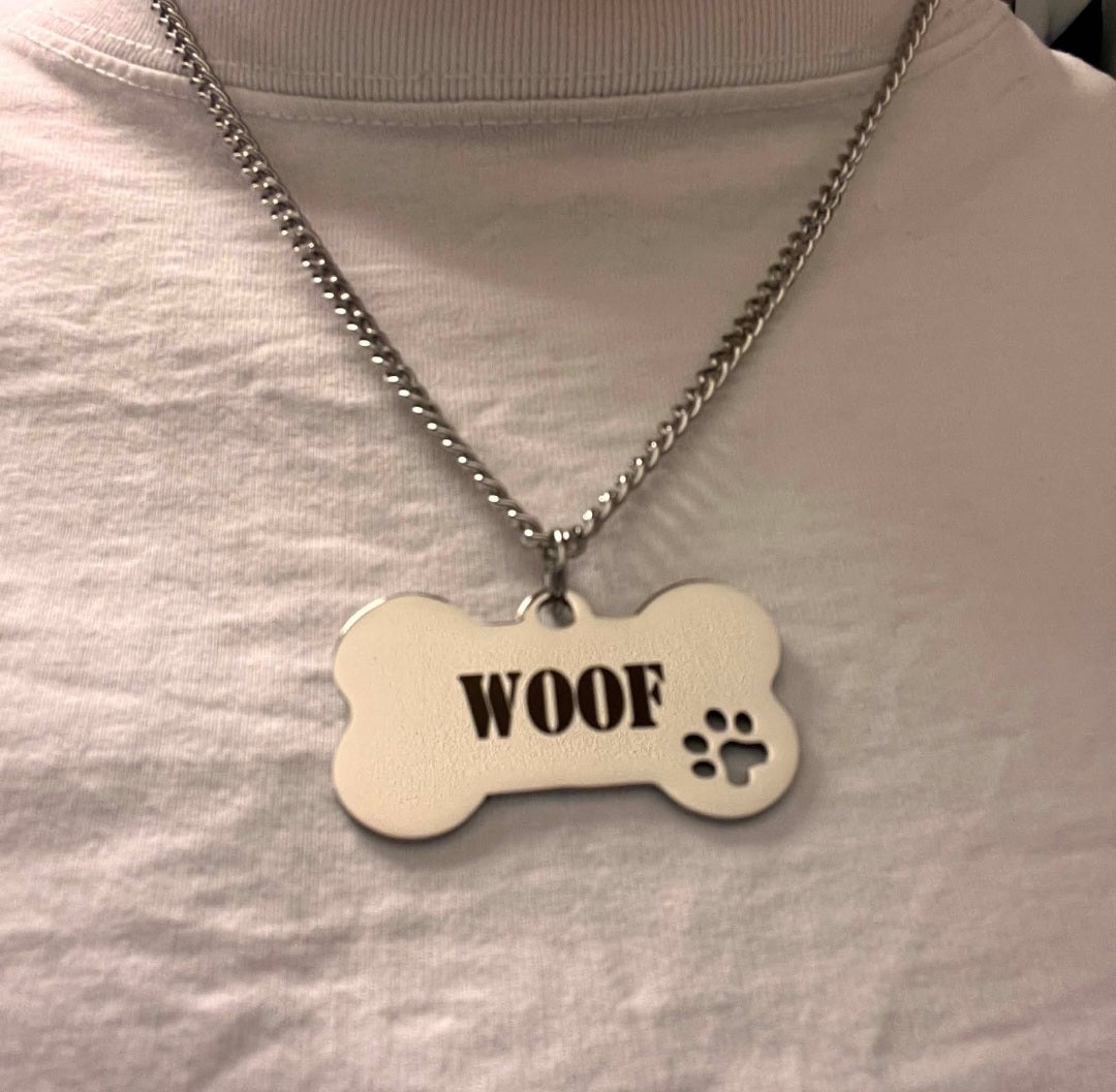 Halsband, puppy ben med texten WOOF plus HUND TASS