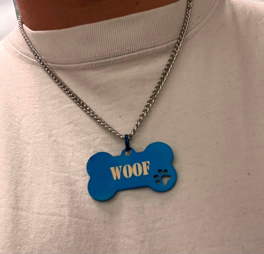 Halsband, puppy ben med texten WOOF plus HUND TASS