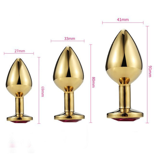 Buttplug i nickelfritt guldfärgad stål