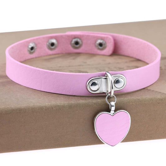 Rosa halsband eller choker med rosa hjärta