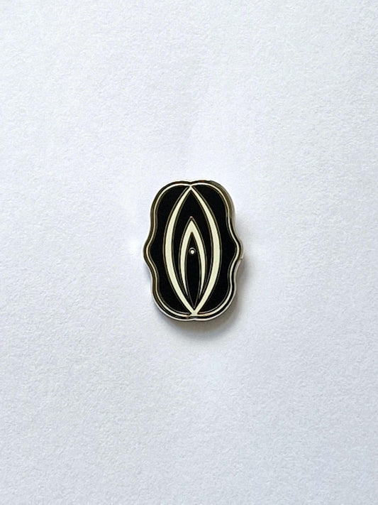 Fun and exciting pin shaped like a silver and black colored pin or snipe