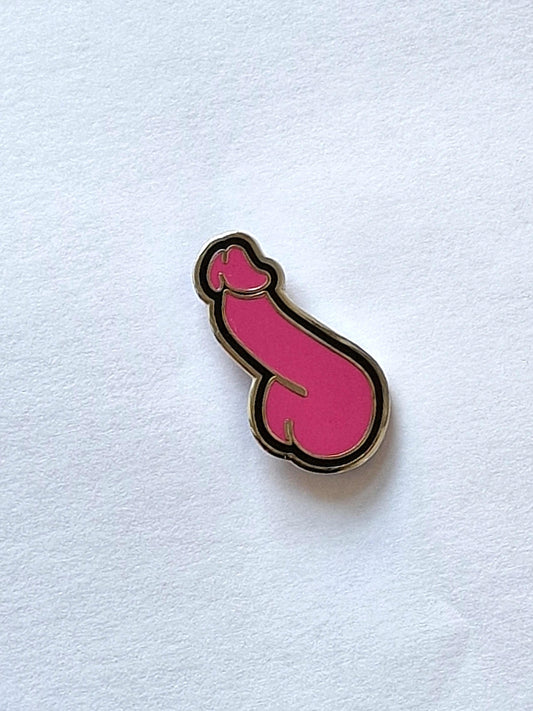 Unique and funny pin, pink and black dick.