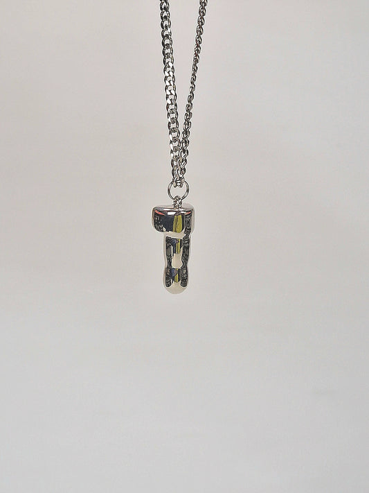 Necklace with a silver-colored dick of 2.5 cm. A unique and beautiful pendant.