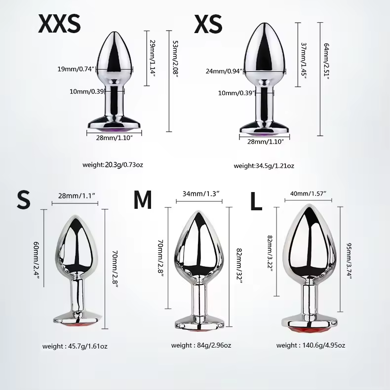 Buttplug i nickelfritt silverfärgat stål med en rund kristall i rosa, lila, blått och transparent färg