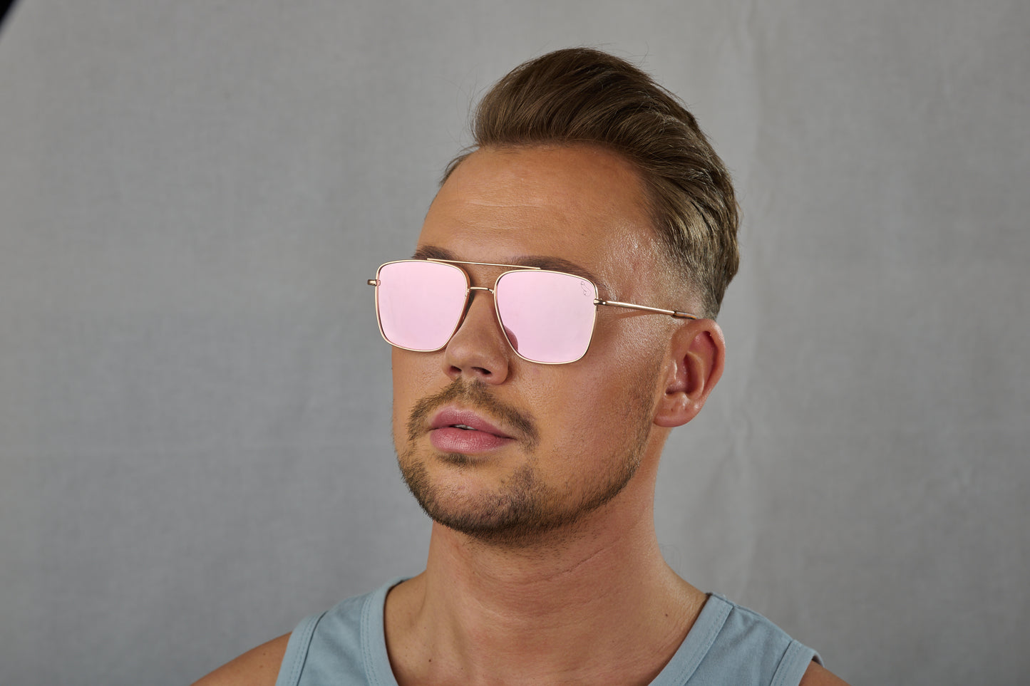 Sunglasses with pink polarized mirror lenses. No. 34